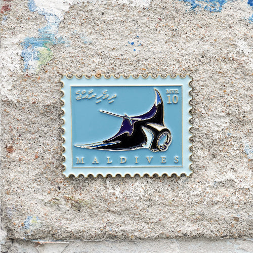 Maldives postage stamp design of a Manta Ray on a textured surface